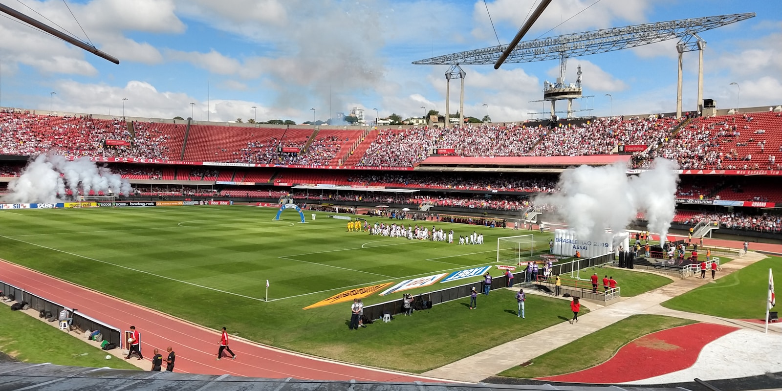 Football teams entering a stadium before an international match