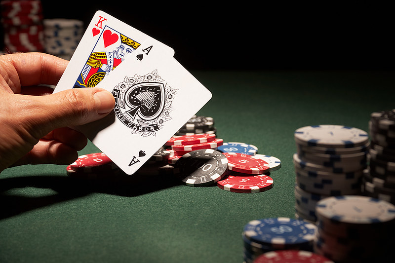 Blackjack cards and casino chips representing a World Cup betting bankroll