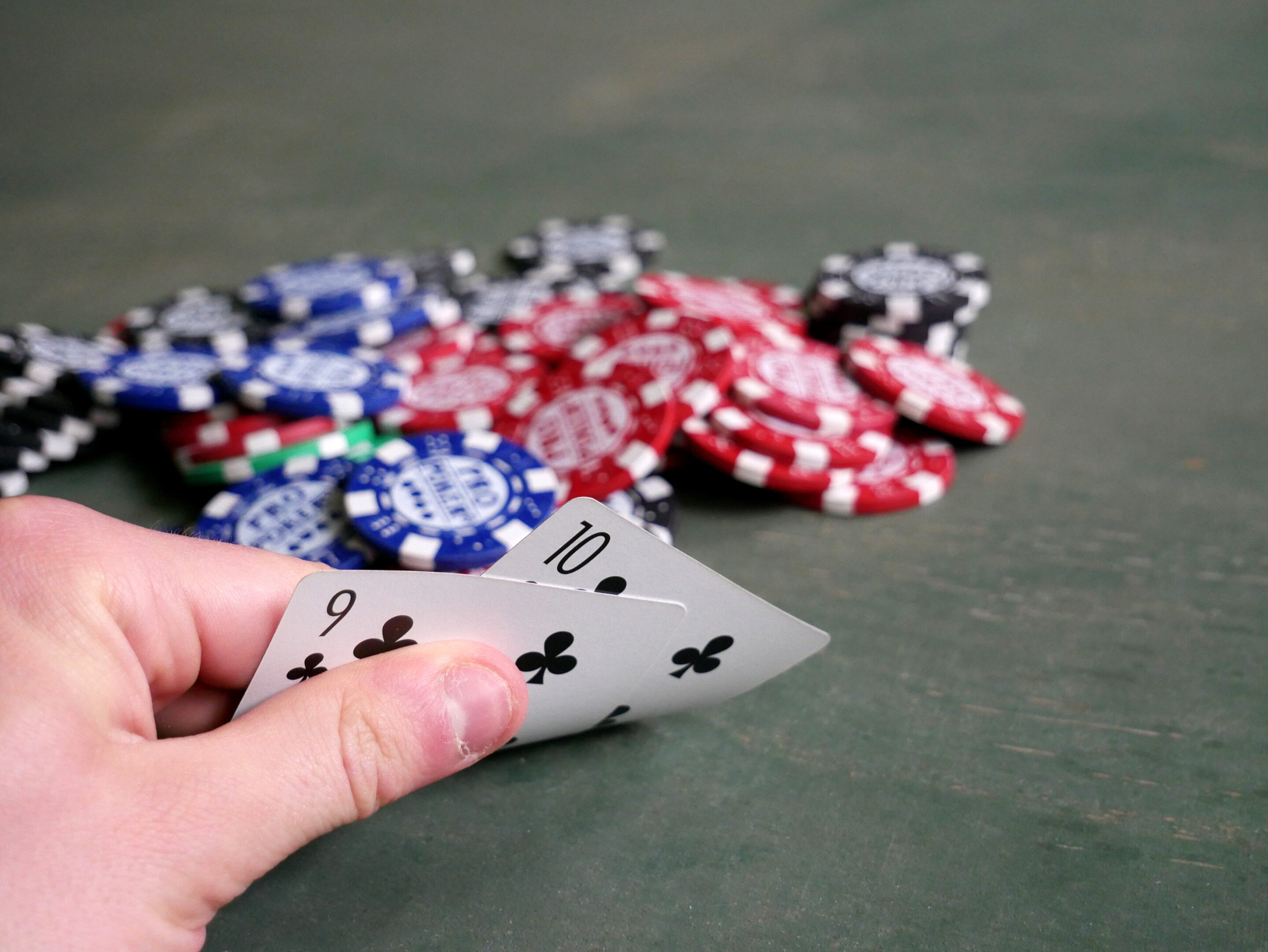 Poker cards and chips for implied probability betting odds explanation