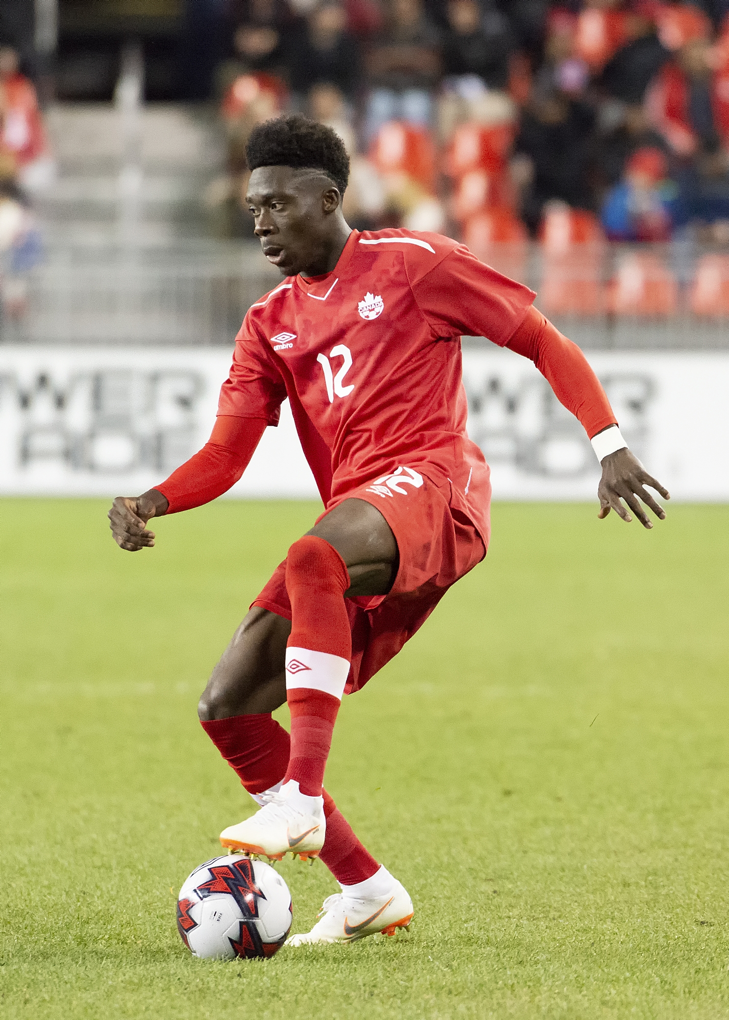 Alphonso Davies playing for Canada before Switzerland vs Canada World Cup preview