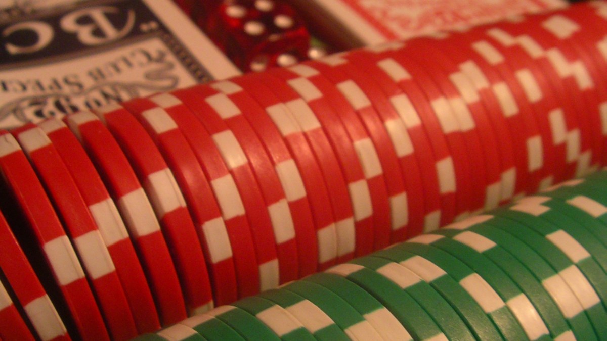 Poker chips representing the difference between prediction markets and sportsbooks