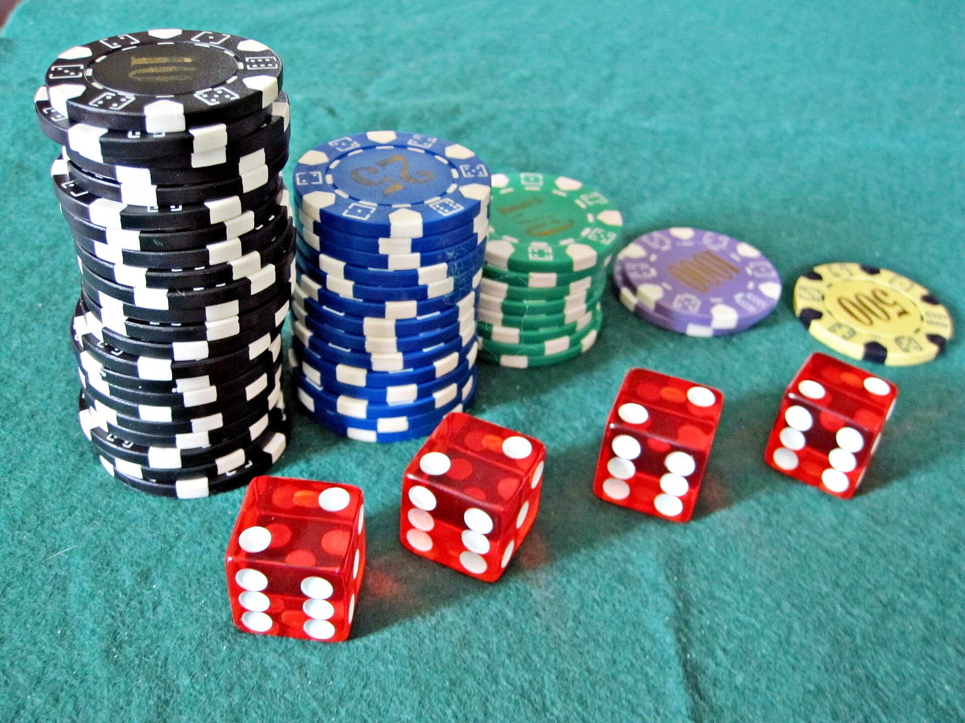 Casino dice and chips representing bank gambling blocks for betting payments