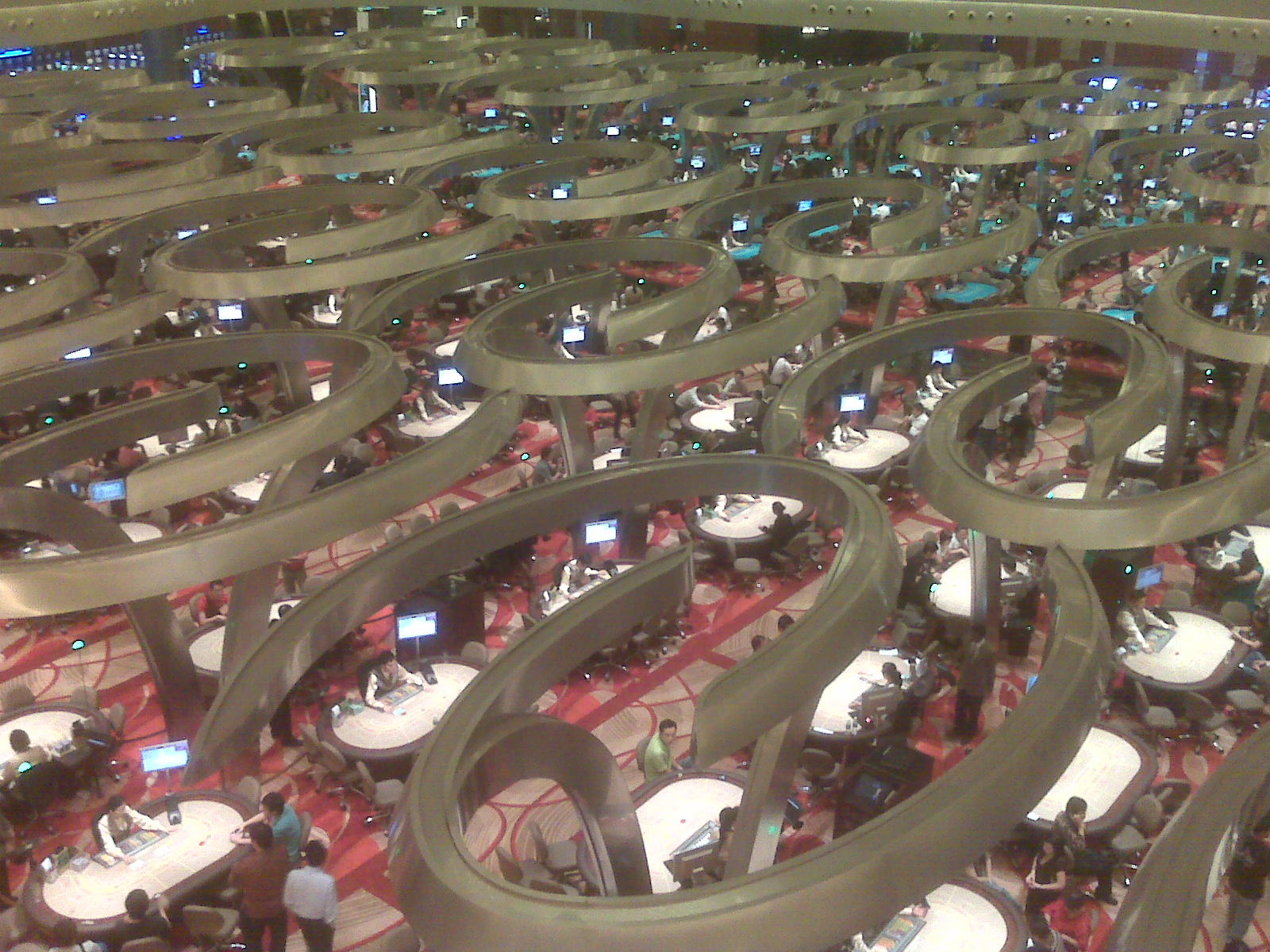 Baccarat tables representing junket operators and VIP gambling risk