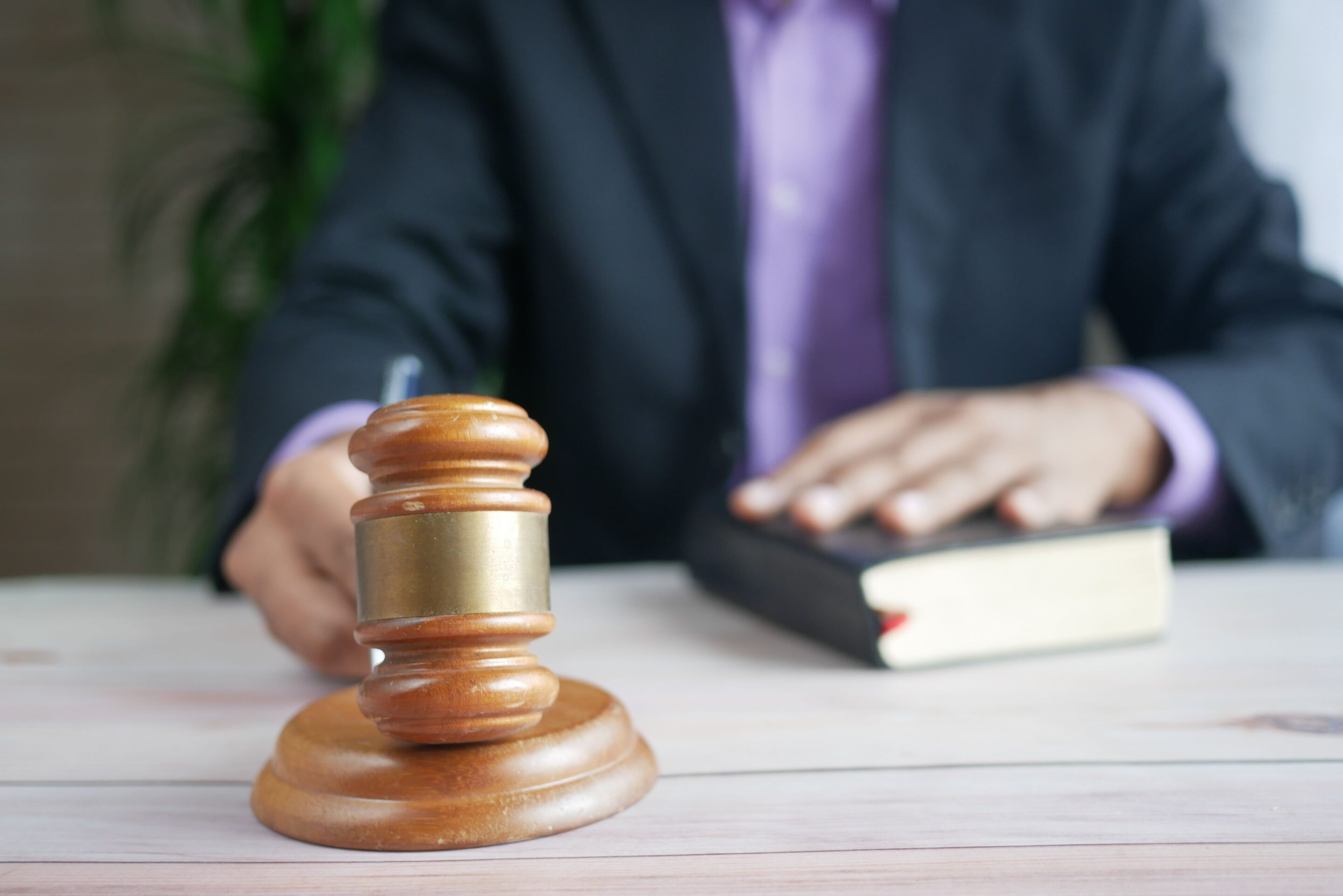 Gavel and legal paperwork representing a cease-and-desist order in online gambling