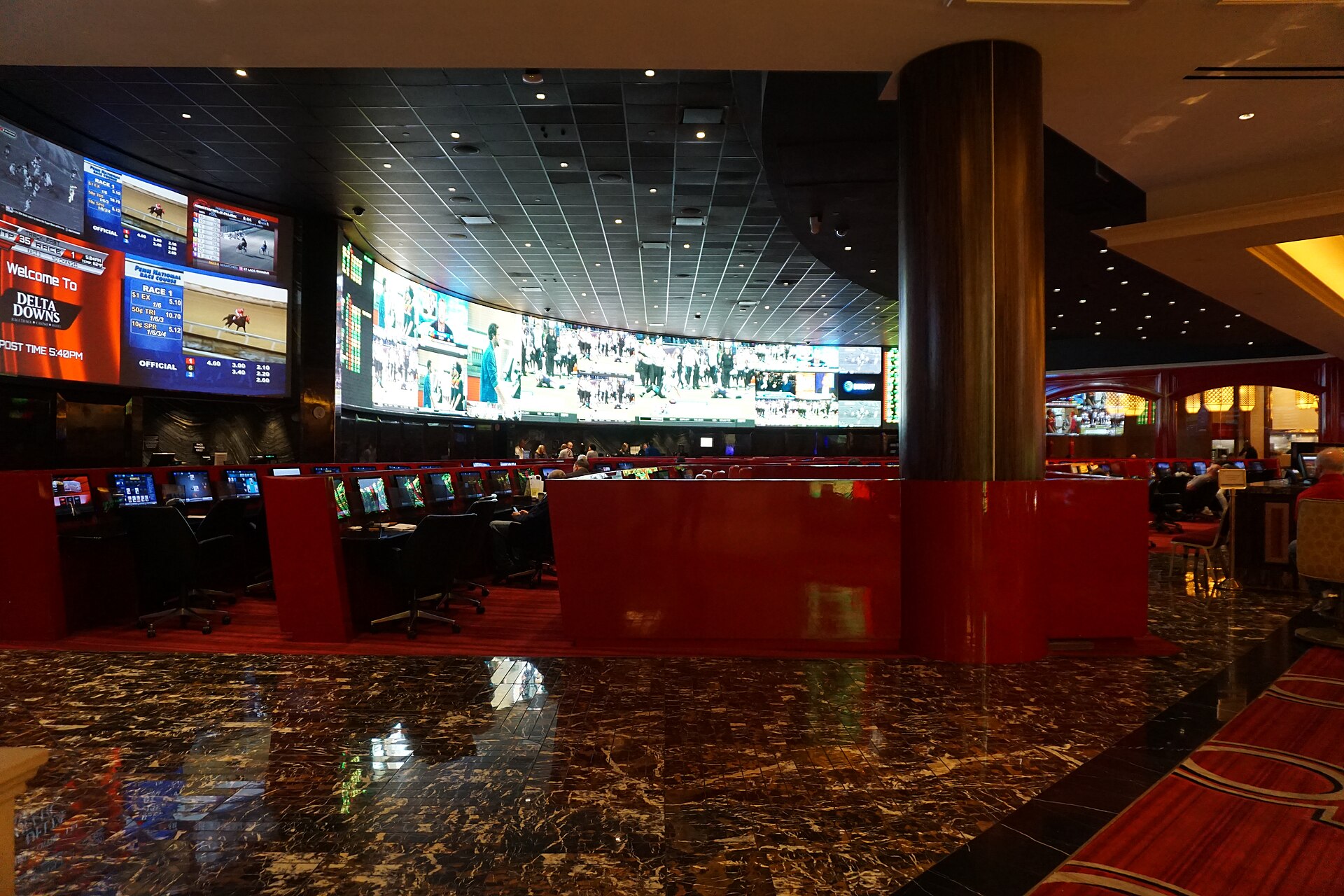 Sportsbook seating and odds screens representing the Coolbet Alberta exit before market launch