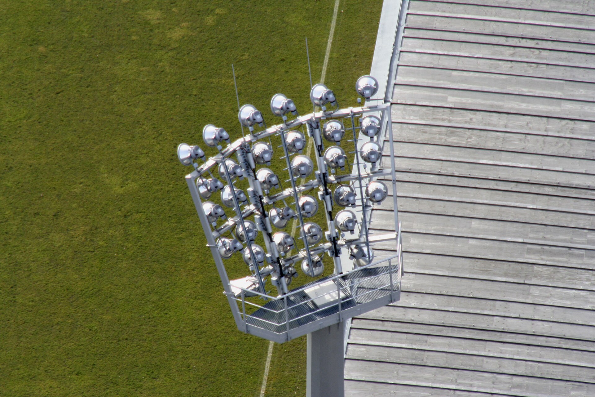 Football floodlights representing a pause after a goal before live betting