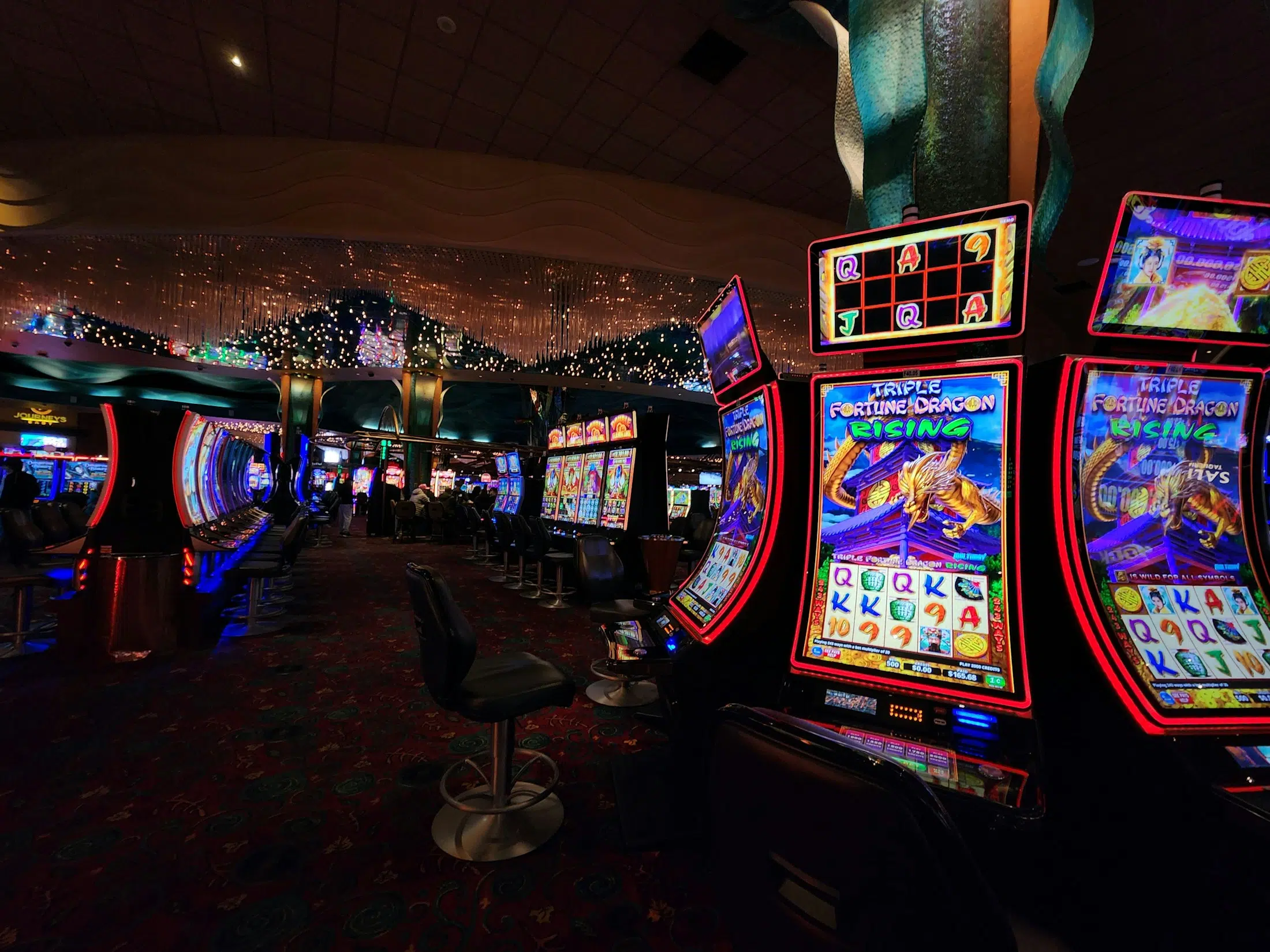 Casino slot floor representing regulated access questions around prediction markets