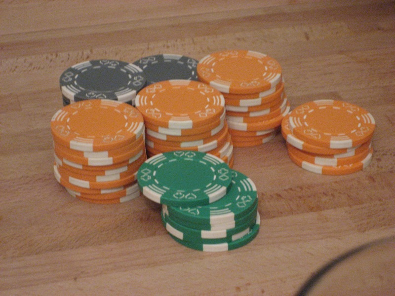 Casino chips representing source of funds and source of wealth checks