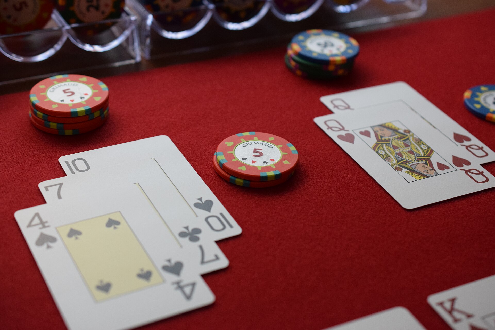 Blackjack table and chips representing testing inspection and certification in iGaming