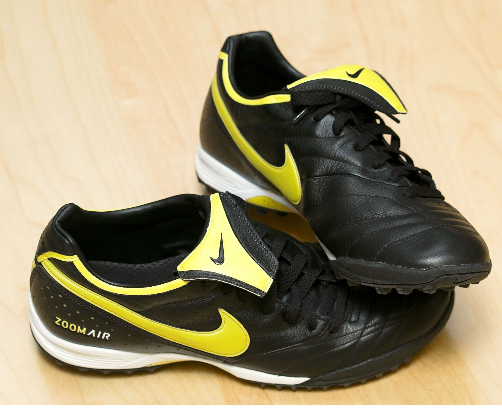 Football boots representing three-way moneyline and to qualify bets