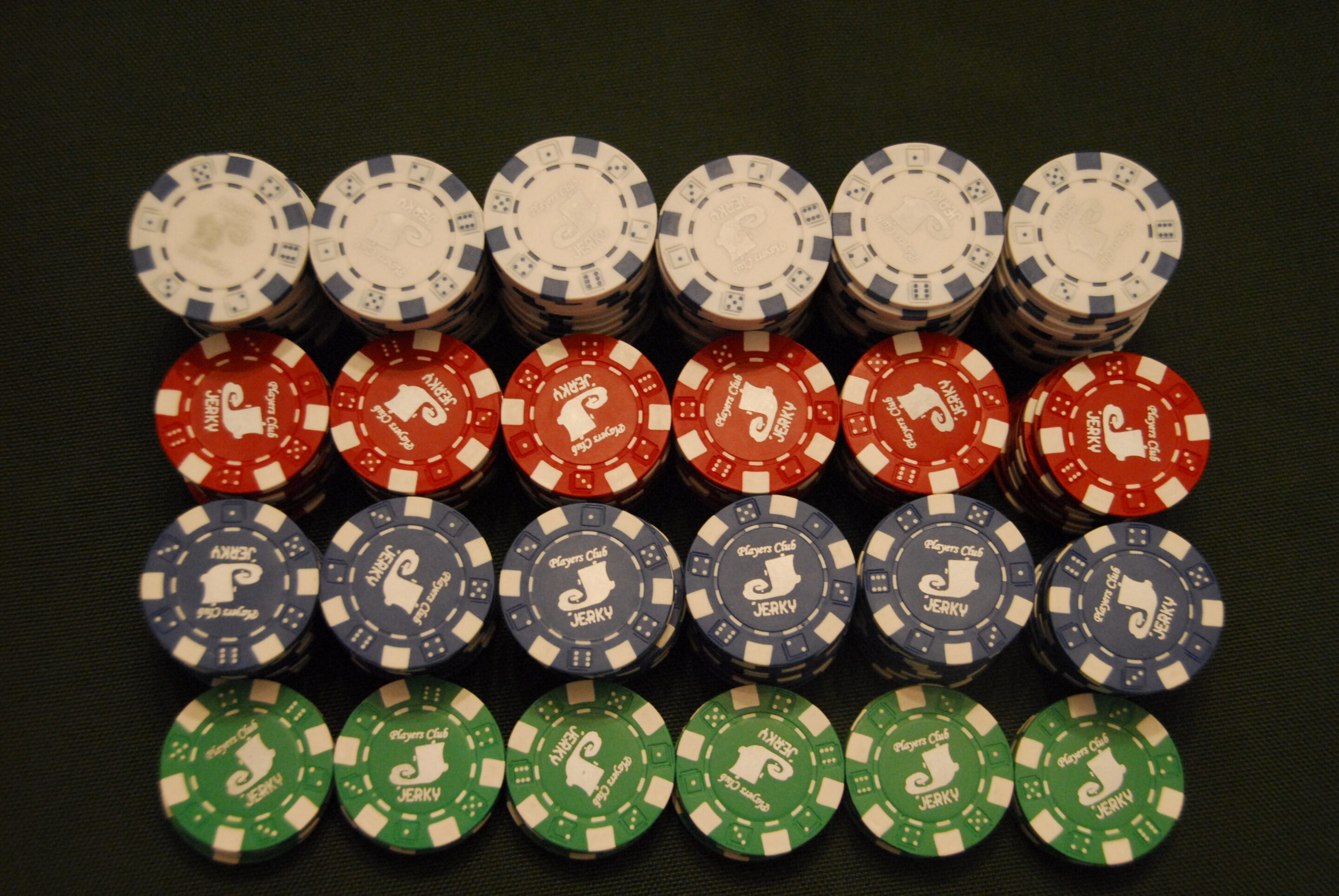 Stacks of casino chips representing unlimited-seat live blackjack