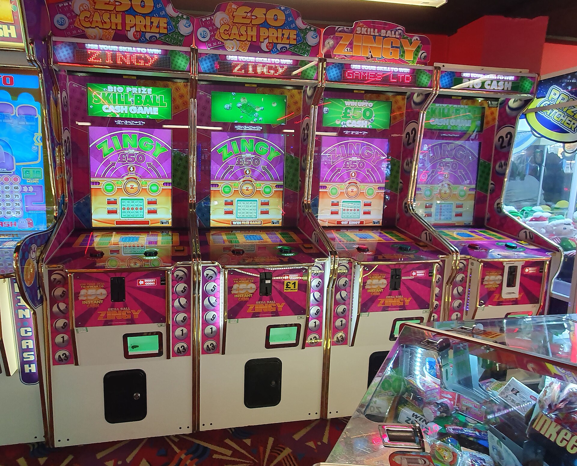 Slot machines in a UK amusement arcade representing adult gaming centres
