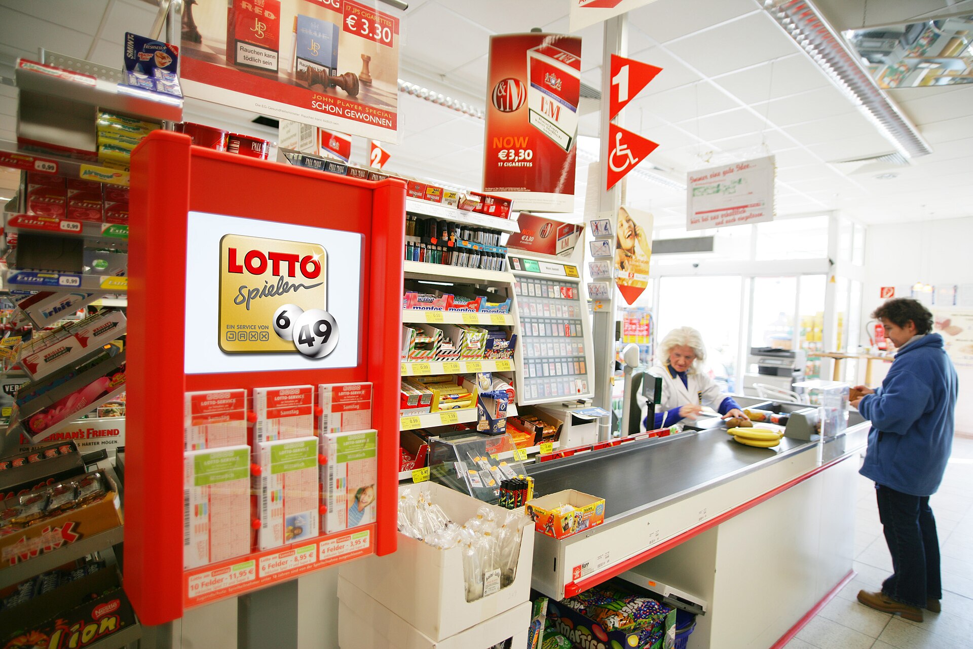 Lottery terminal representing Allwyn Player Protection Lab awards and safer-gambling research