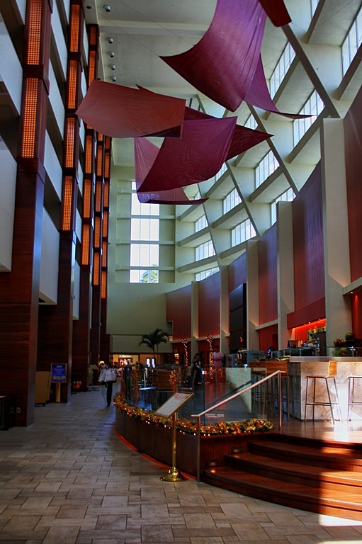 Casino resort lobby representing branded slots and licensed entertainment themes