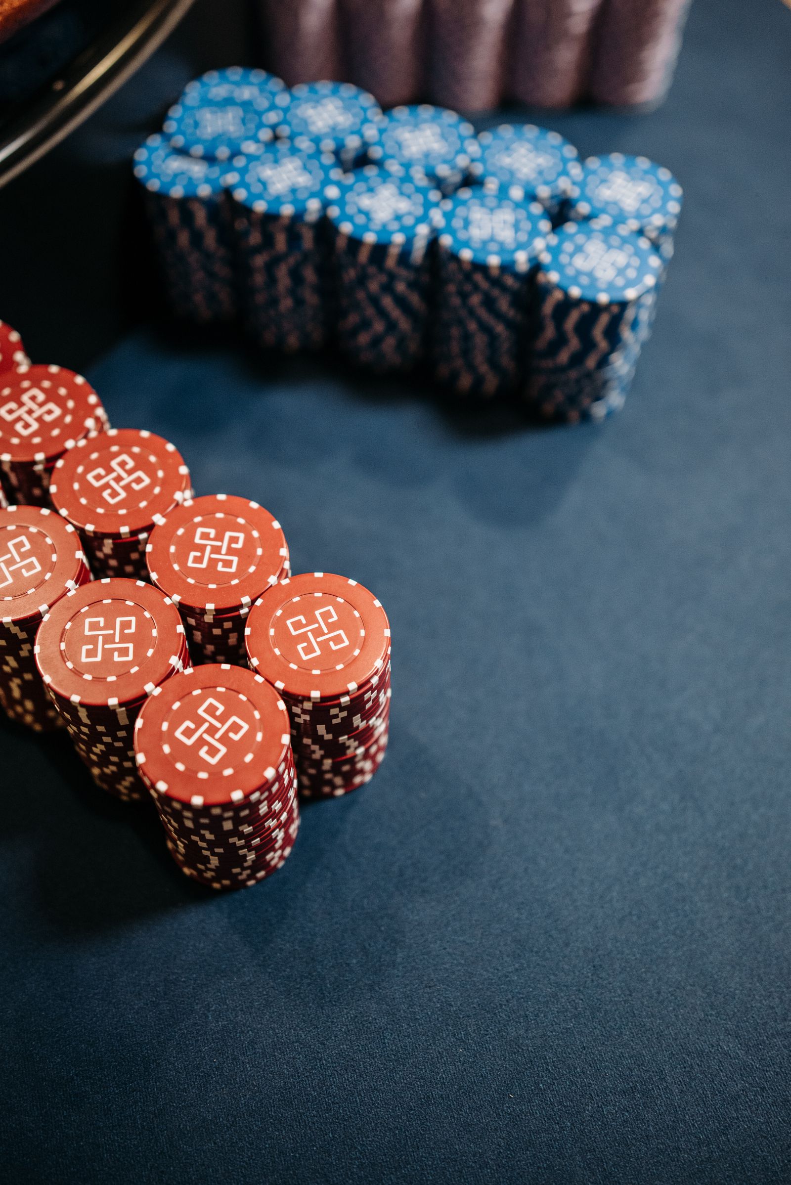 Stacks of casino chips representing bettor refunds after Brazil suspended Pixbet