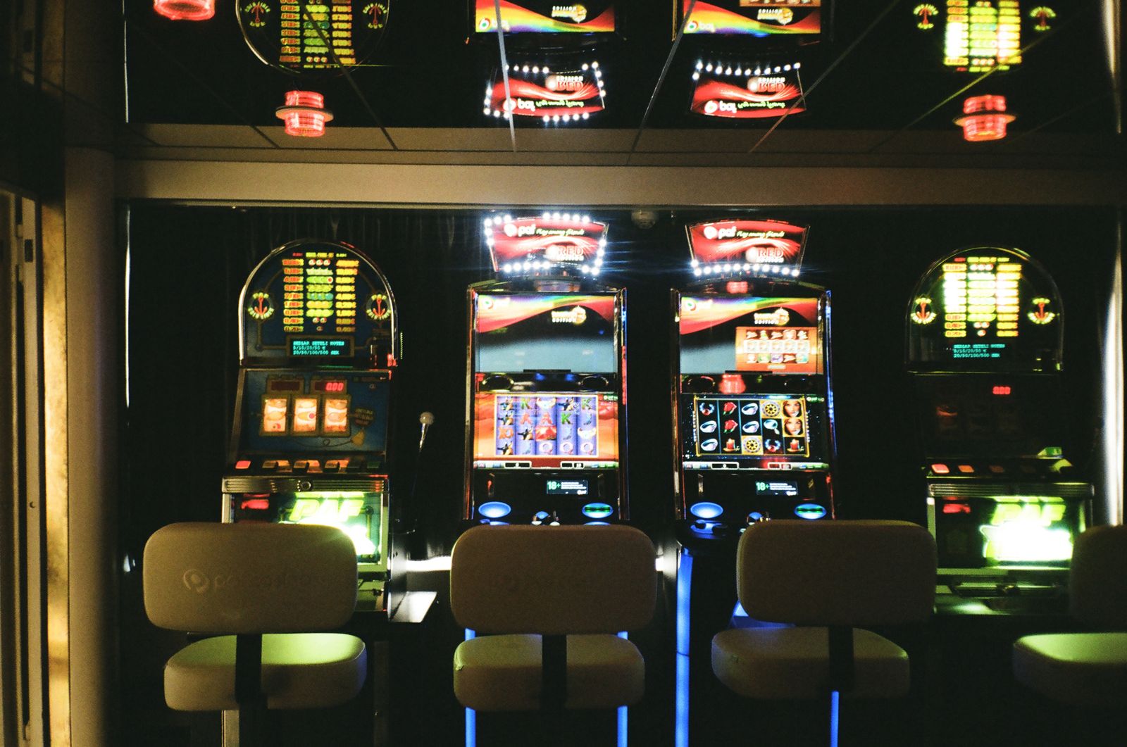 Slot machines and casino chairs representing a non-smoking casino room