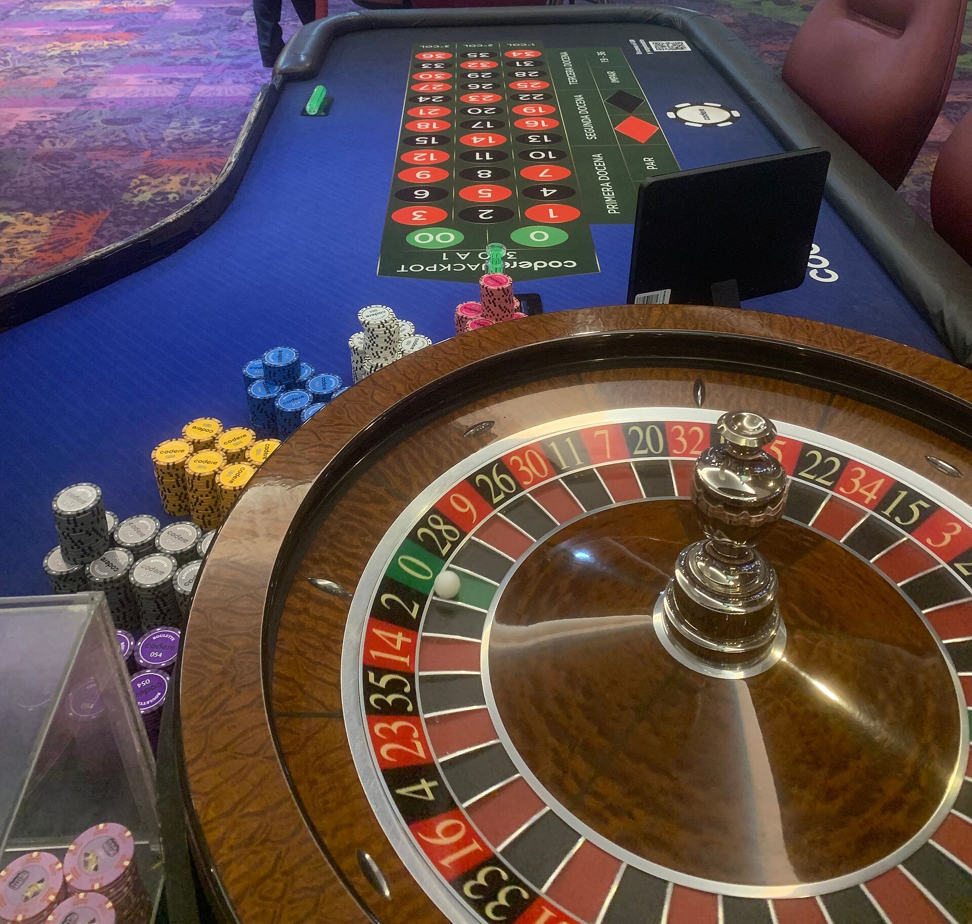 Casino roulette table representing progressive jackpot slot mechanics explained