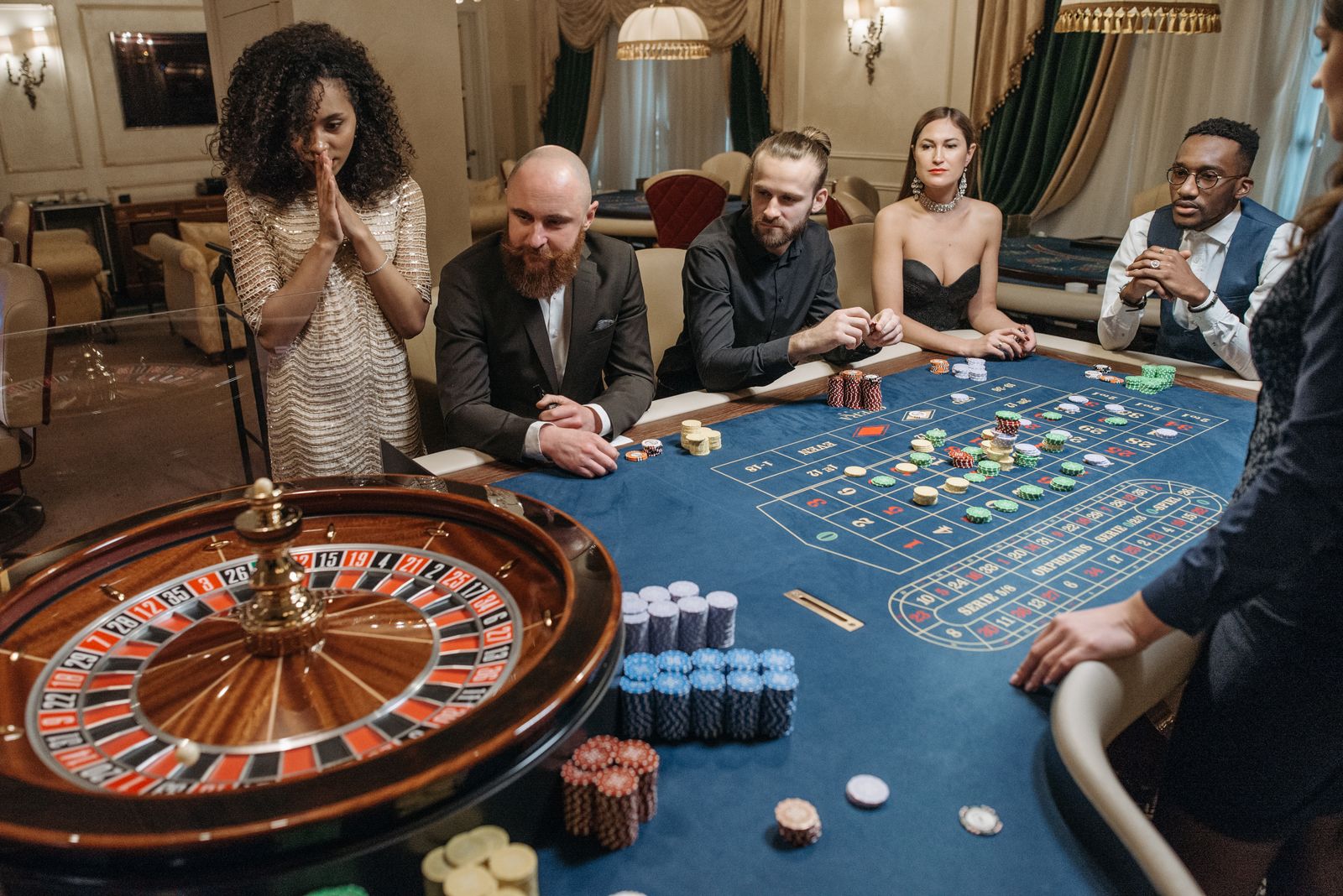 Roulette table in a casino representing land-based gambling compared with remote gambling