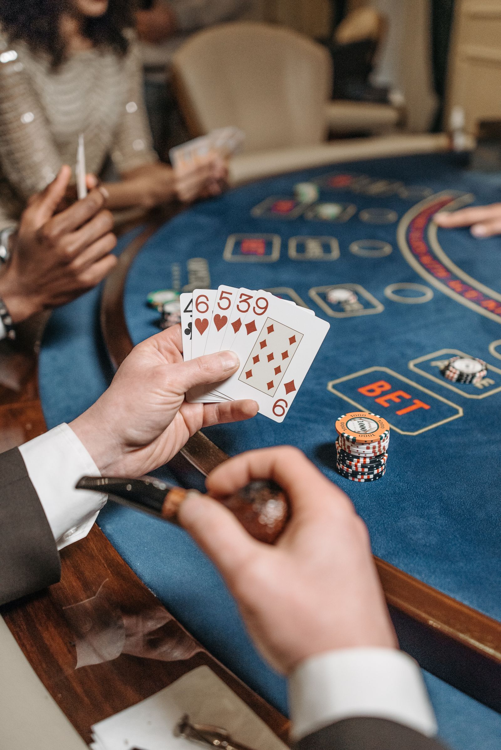 Casino table with cards and chips representing a sportsbook VIP offer