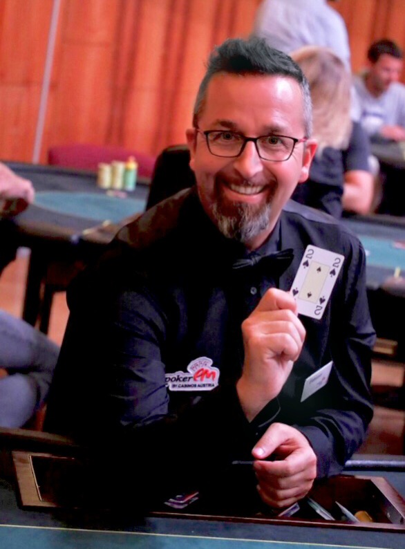 Poker dealer representing supplier risk and casino oversight