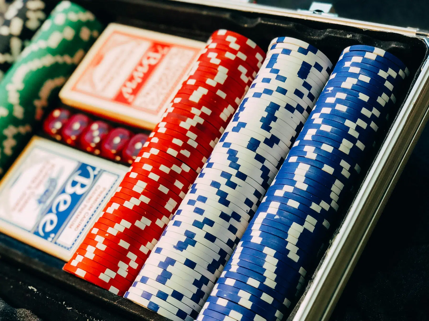 Playing cards and chips representing casino account verification before withdrawal