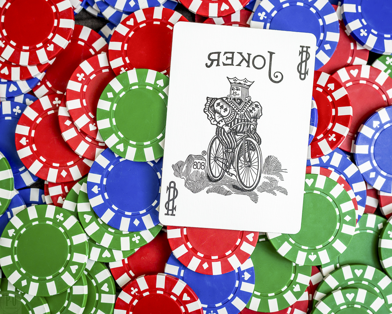 Poker chips and playing card representing white-label casino partnership risk