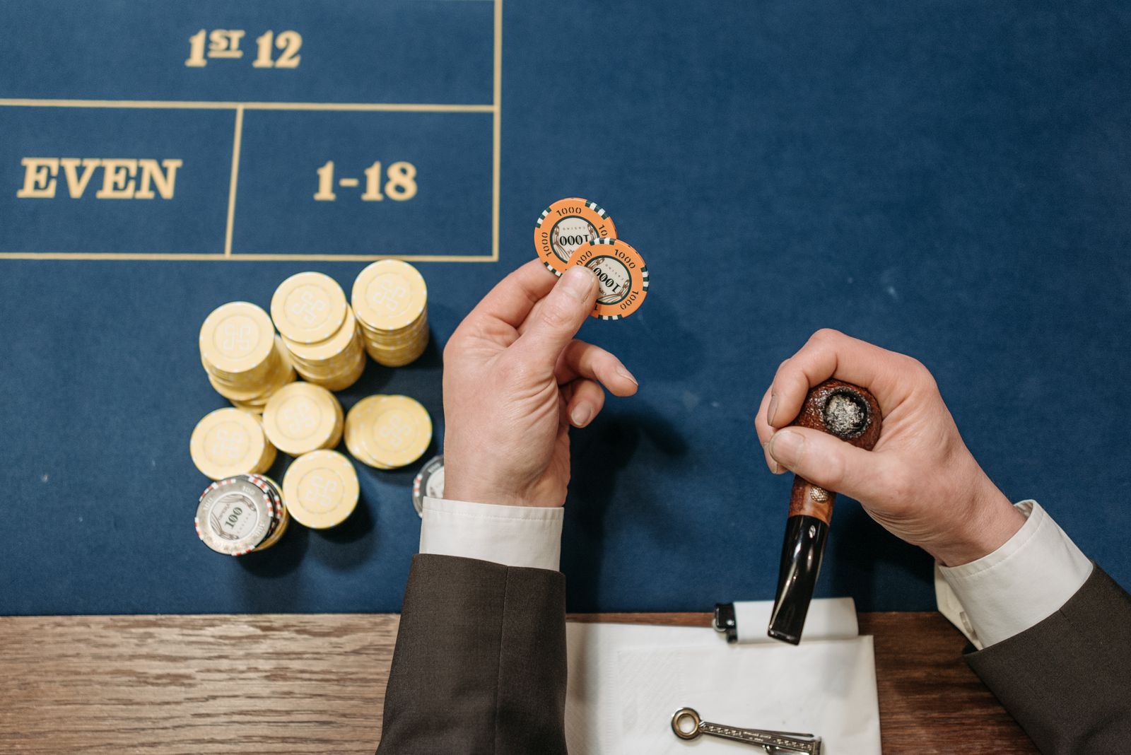 Casino table and chips representing a game rules check before betting