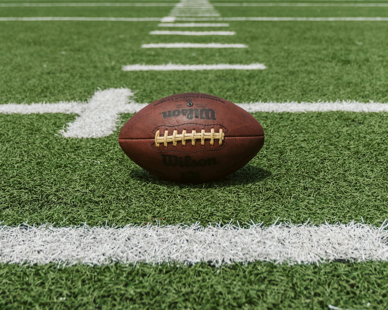 American football on a marked field before a game